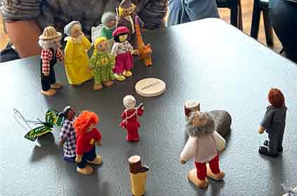 little dolls laid our on a table