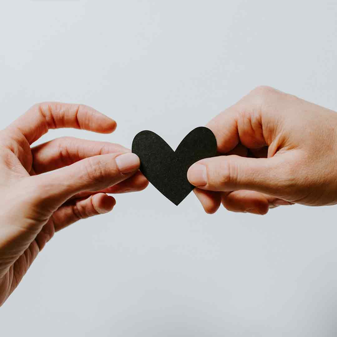 hands holding heart to represent trauma-informed practice training